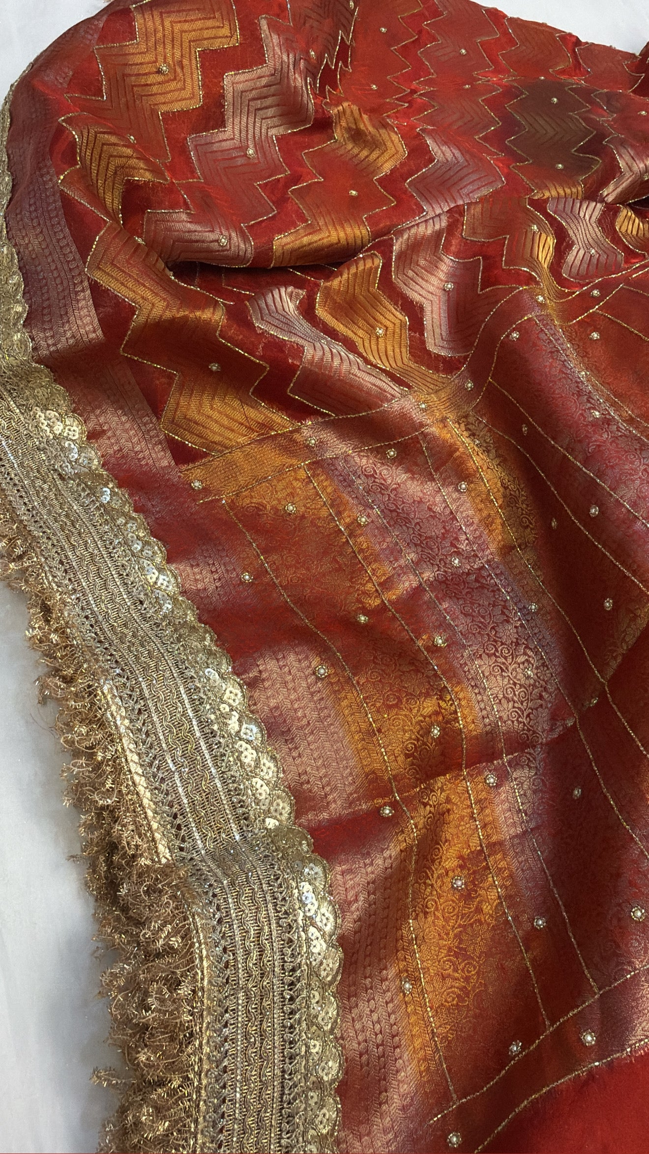 Tomato red husn tissue silk hand embroidered kadhwa saree